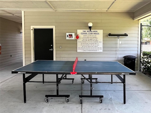 610 Huntly Ln, Winter Springs, FL 32708 - recreation room with wood walls and concrete flooring