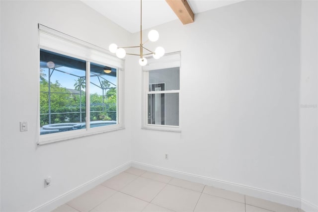2540 Wembleycross Way, Orlando, FL 32828 - spare room with beam ceiling, a chandelier, and light tile patterned flooring