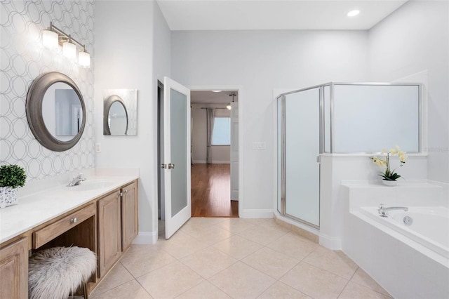 2540 Wembleycross Way, Orlando, FL 32828 - full bath with vanity, a bath, a stall shower, and tile patterned floors