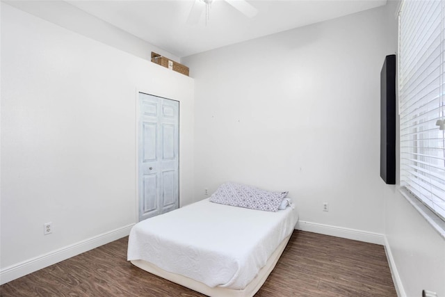 2540 Wembleycross Way, Orlando, FL 32828 - bedroom with wood finished floors, ceiling fan, and a closet