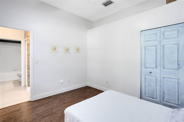 2540 Wembleycross Way, Orlando, FL 32828 - bedroom featuring dark wood-style floors and baseboards