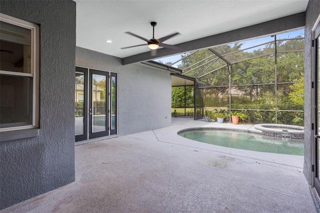 2540 Wembleycross Way, Orlando, FL 32828 - view of swimming pool featuring a patio area, a ceiling fan, a pool with connected hot tub, and glass enclosure