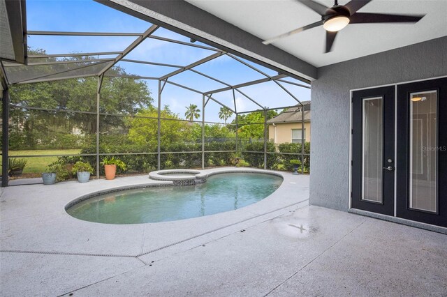 2540 Wembleycross Way, Orlando, FL 32828 - view of pool with a patio area, a pool with connected hot tub, a ceiling fan, and a lanai