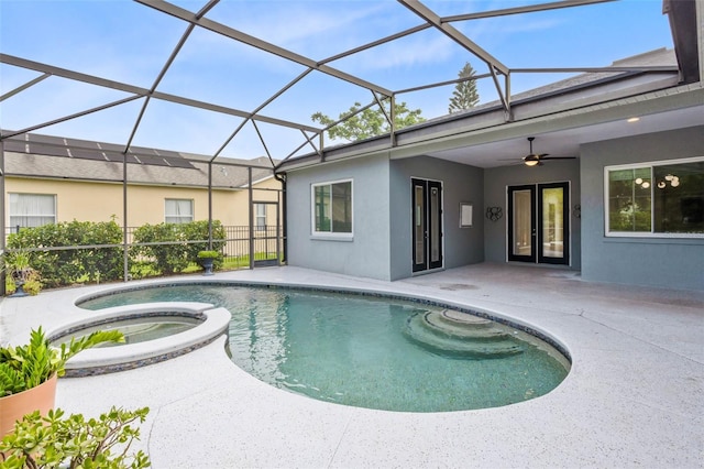 2540 Wembleycross Way, Orlando, FL 32828 - view of pool featuring a patio area, a ceiling fan, a pool with connected hot tub, and a lanai