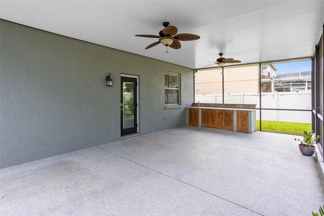 2540 Wembleycross Way, Orlando, FL 32828 - unfurnished sunroom featuring ceiling fan
