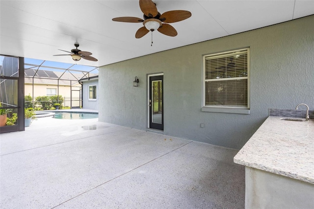 2540 Wembleycross Way, Orlando, FL 32828 - view of patio with a ceiling fan, glass enclosure, and a pool with connected hot tub