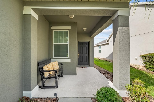 3443 Sagebrush St, Harmony, FL 34773 - view of exterior entry featuring stucco siding