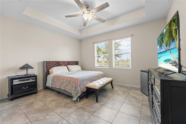 3443 Sagebrush St, Harmony, FL 34773 - bedroom with a raised ceiling, light tile patterned floors, and ceiling fan