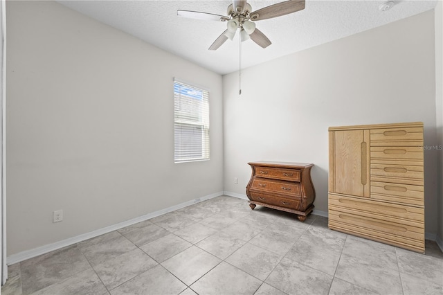3443 Sagebrush St, Harmony, FL 34773 - bedroom featuring a textured ceiling, ceiling fan, and light tile patterned floors