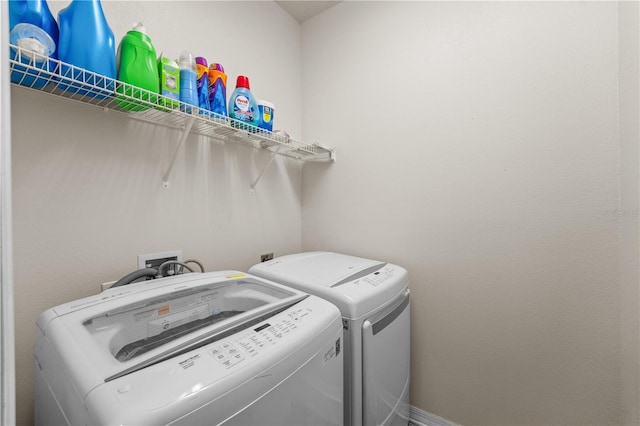 3443 Sagebrush St, Harmony, FL 34773 - washroom featuring washing machine and clothes dryer