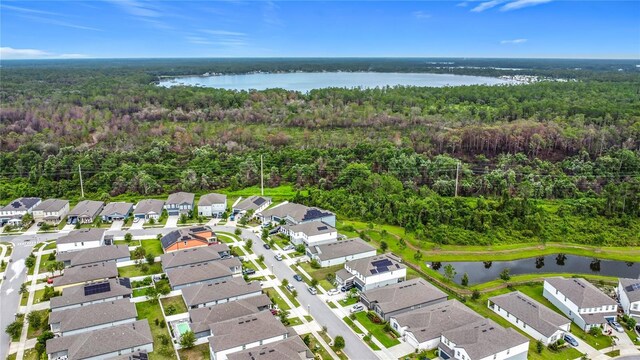 711 Steerview St, Saint Cloud, FL 34771 - aerial view of property and surrounding area with nearby suburban area and a nearby body of water