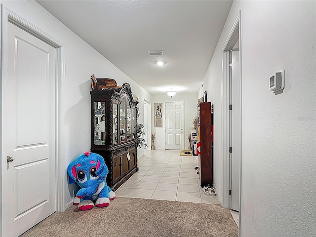 711 Steerview St, Saint Cloud, FL 34771 - corridor with light tile patterned flooring