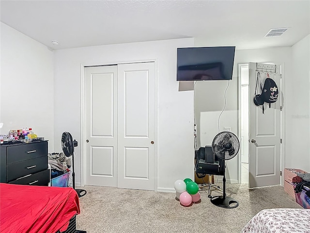 711 Steerview St, Saint Cloud, FL 34771 - bedroom featuring a closet and carpet flooring
