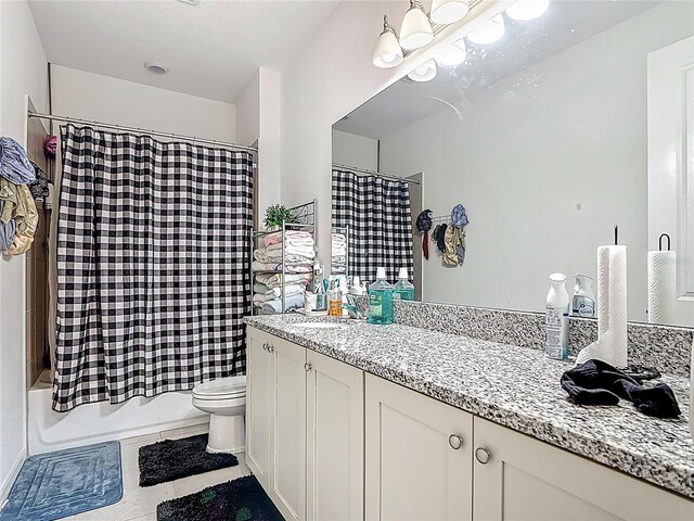 711 Steerview St, Saint Cloud, FL 34771 - full bath with vanity, shower / tub combo with curtain, and tile patterned flooring