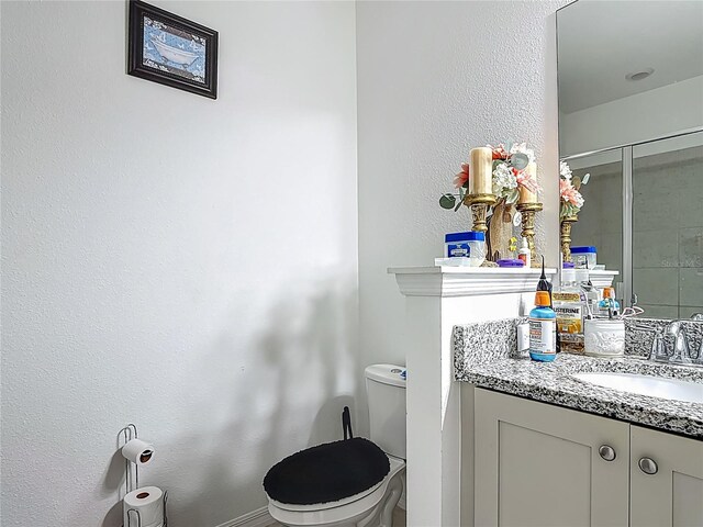 711 Steerview St, Saint Cloud, FL 34771 - bathroom featuring vanity and a shower with shower door