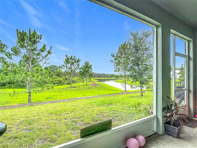 711 Steerview St, Saint Cloud, FL 34771 - view of grassy yard with a water view and view of scattered trees