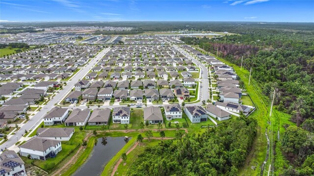 711 Steerview St, Saint Cloud, FL 34771 - aerial view of residential area featuring a nearby body of water