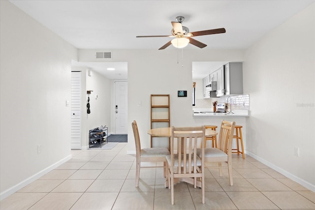 1036 Bonaire Dr Unit 2834, Altamonte Springs, FL 32714 - dining room with a ceiling fan and light tile patterned floors