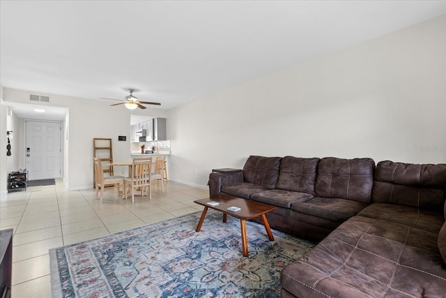 1036 Bonaire Dr Unit 2834, Altamonte Springs, FL 32714 - living area featuring light tile patterned floors and a ceiling fan