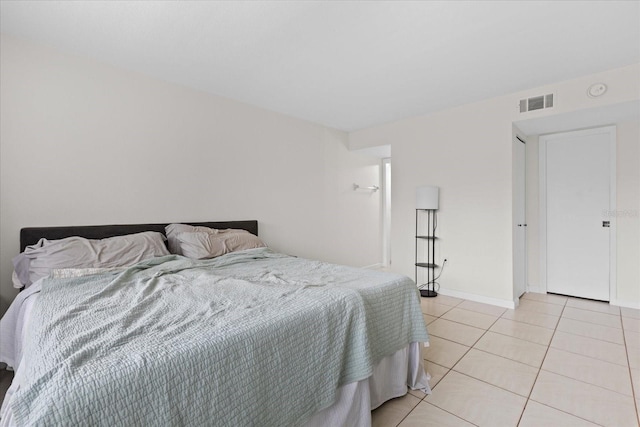 1036 Bonaire Dr Unit 2834, Altamonte Springs, FL 32714 - bedroom featuring light tile patterned floors and baseboards
