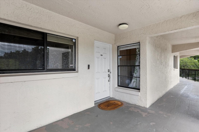 1036 Bonaire Dr Unit 2834, Altamonte Springs, FL 32714 - view of exterior entry with stucco siding