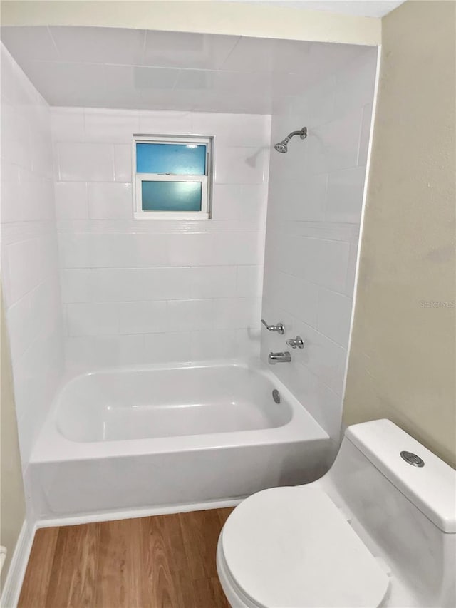 4233 Las Vegas Dr, New Port Richey, FL 34653 - full bath with wood finished floors and shower / tub combination