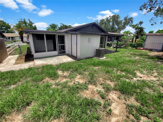 4233 Las Vegas Dr, New Port Richey, FL 34653 - back of house with a sunroom