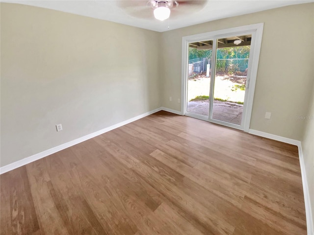 4233 Las Vegas Dr, New Port Richey, FL 34653 - empty room with wood finished floors and ceiling fan
