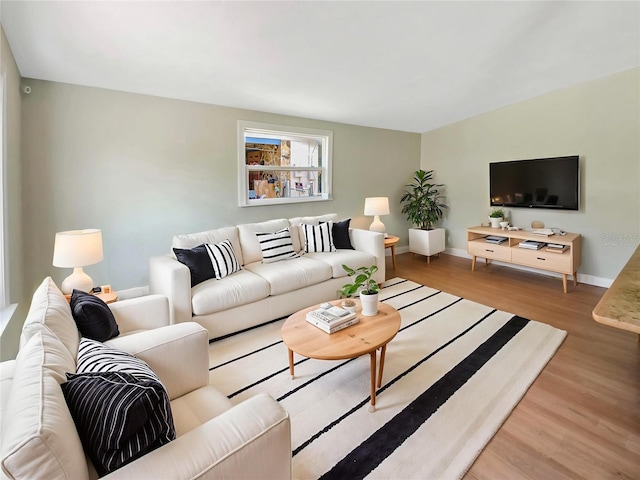 4233 Las Vegas Dr, New Port Richey, FL 34653 - living room featuring wood finished floors and baseboards