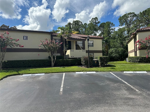 3279 Westridge Blvd Unit 204, Orlando, FL 32822 - view of property with uncovered parking