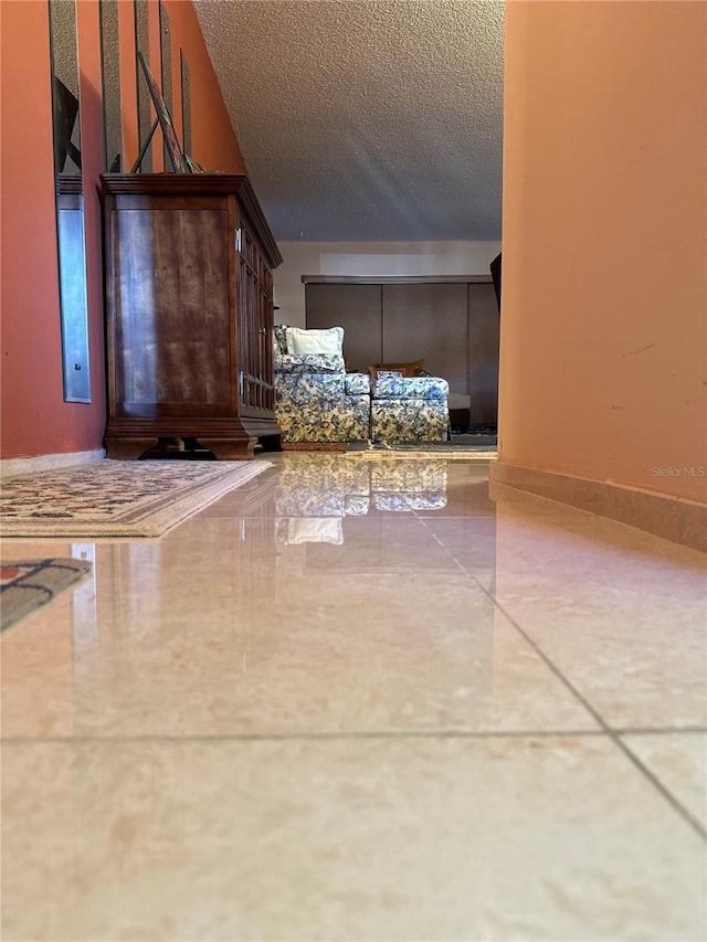 3279 Westridge Blvd Unit 204, Orlando, FL 32822 - hallway with a textured ceiling