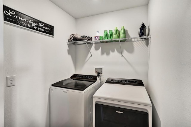 1056 Plantation Ln, Davenport, FL 33896 - washroom featuring washing machine and clothes dryer
