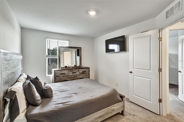 1056 Plantation Ln, Davenport, FL 33896 - bedroom featuring carpet floors and a textured ceiling