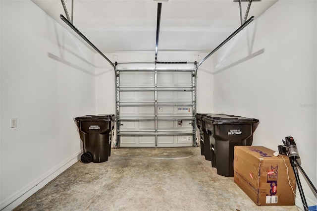 1056 Plantation Ln, Davenport, FL 33896 - garage with baseboards