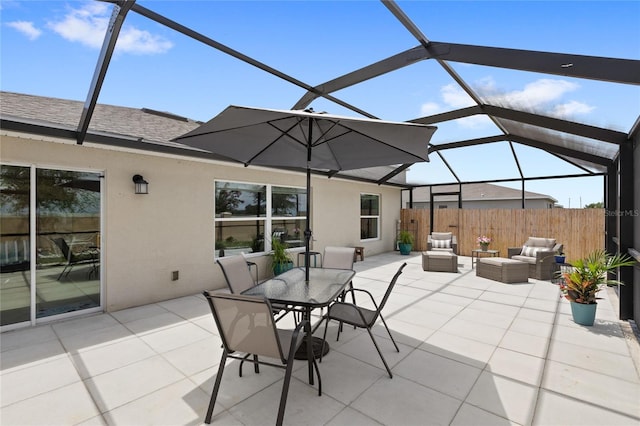 1291 Lassen St, Haines City, FL 33844 - view of patio / terrace with outdoor lounge area and glass enclosure