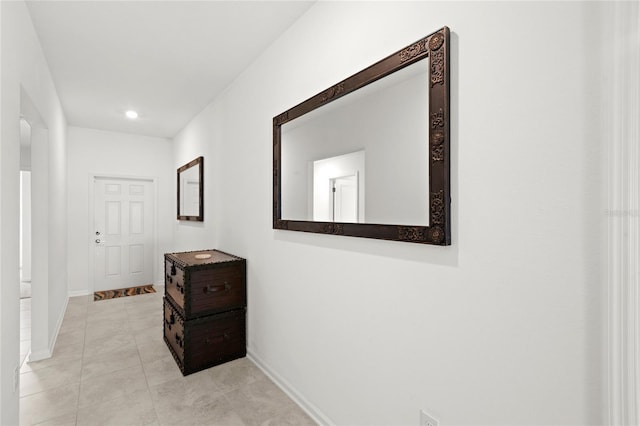 1291 Lassen St, Haines City, FL 33844 - corridor featuring light tile patterned flooring and recessed lighting