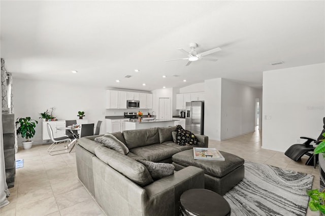 1291 Lassen St, Haines City, FL 33844 - living area featuring ceiling fan, light tile patterned floors, recessed lighting, and lofted ceiling