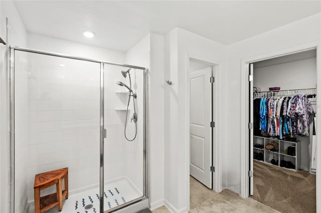 1291 Lassen St, Haines City, FL 33844 - bathroom featuring a stall shower and a spacious closet