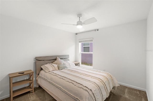 1291 Lassen St, Haines City, FL 33844 - carpeted bedroom featuring baseboards and a ceiling fan