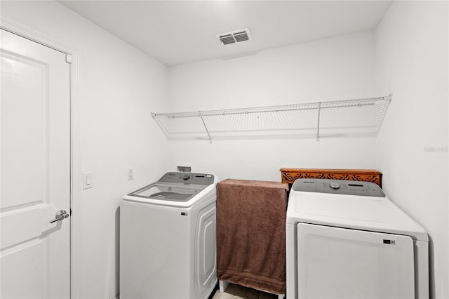 1291 Lassen St, Haines City, FL 33844 - washroom featuring independent washer and dryer