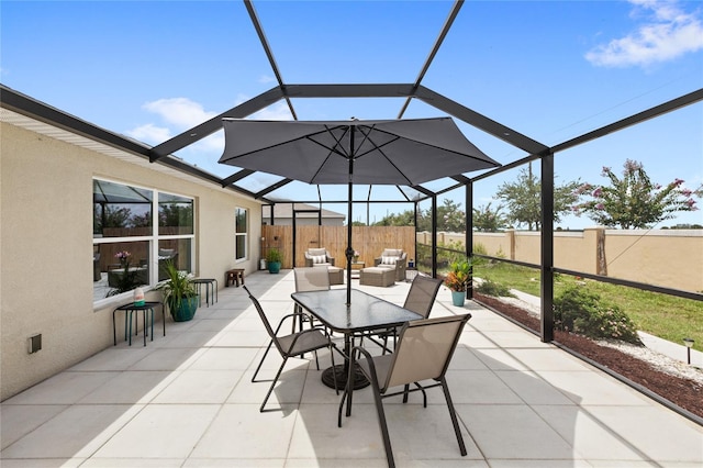 1291 Lassen St, Haines City, FL 33844 - fenced backyard featuring a patio area, a lanai, and outdoor dining area