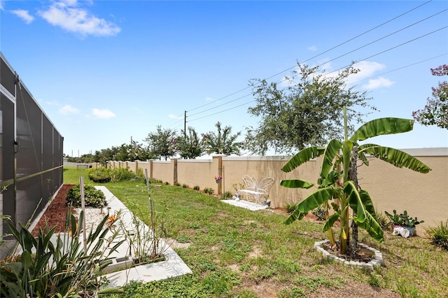 1291 Lassen St, Haines City, FL 33844 - fenced backyard with glass enclosure