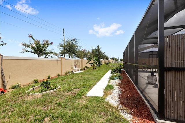 1291 Lassen St, Haines City, FL 33844 - fenced backyard featuring a lanai