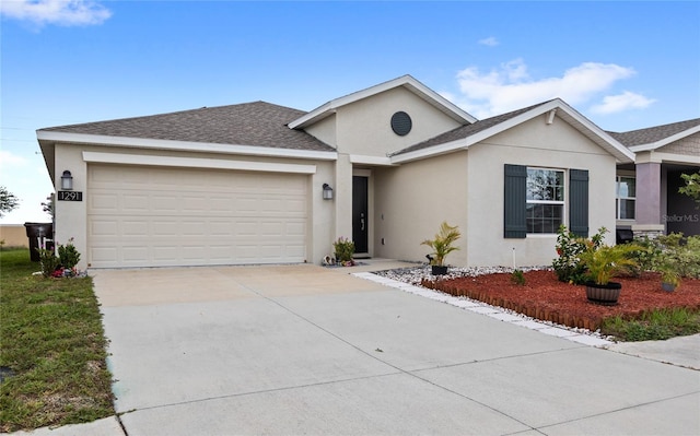 1291 Lassen St, Haines City, FL 33844 - ranch-style home featuring stucco siding, an attached garage, and driveway