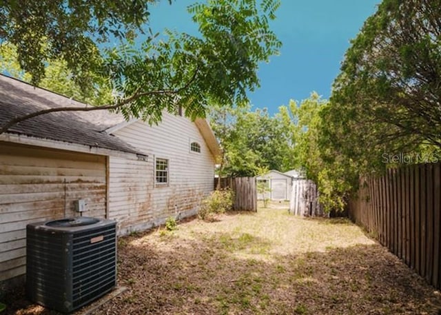 6140 SE 46th Avenue Rd, Ocala, FL 34480 - fenced backyard with a storage shed