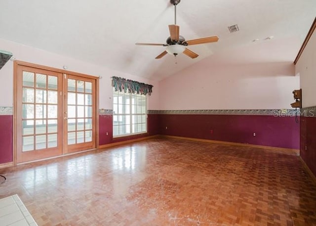 6140 SE 46th Avenue Rd, Ocala, FL 34480 - spare room with ceiling fan, french doors, vaulted ceiling, and wainscoting