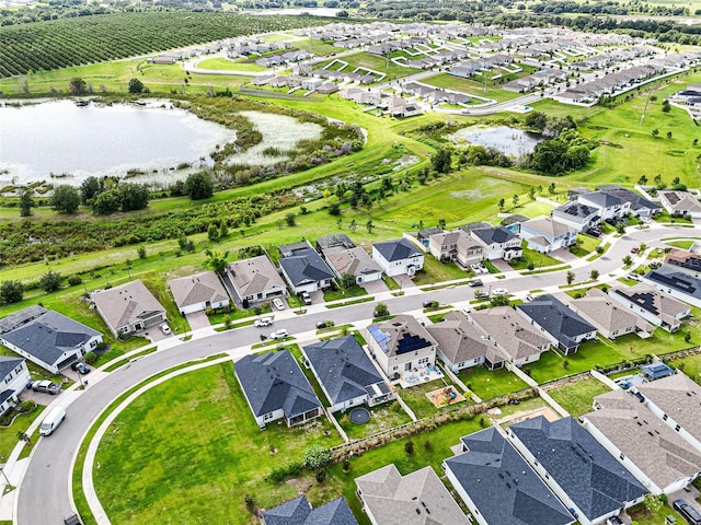 1668 Wilson Prairie Cir, Groveland, FL 34736 - aerial perspective of suburban area with a large body of water