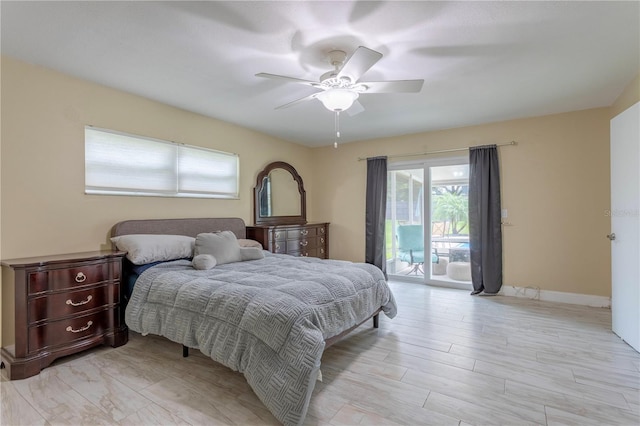 5361 Jade Cir, Belle Isle, FL 32812 - bedroom with access to outside, a ceiling fan, and light wood-style floors