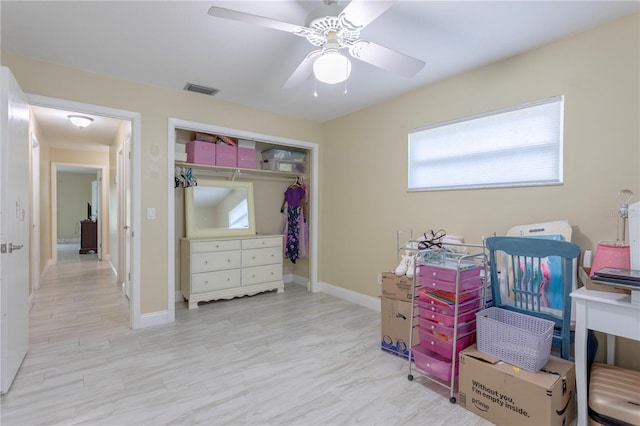 5361 Jade Cir, Belle Isle, FL 32812 - bedroom featuring a closet, a ceiling fan, and wood finished floors