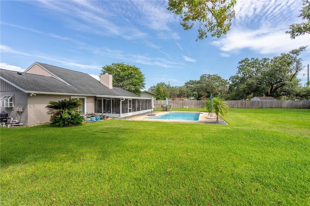 5361 Jade Cir, Belle Isle, FL 32812 - fenced backyard with a sunroom